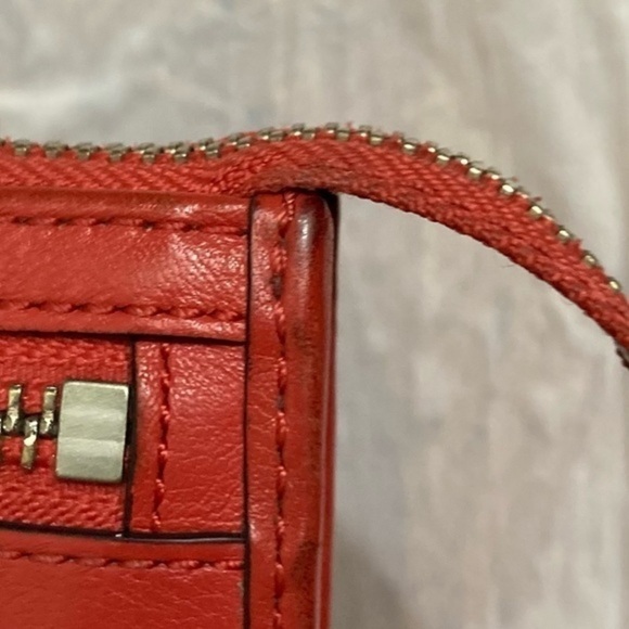 Coach red orange leopard print wristlet bag
